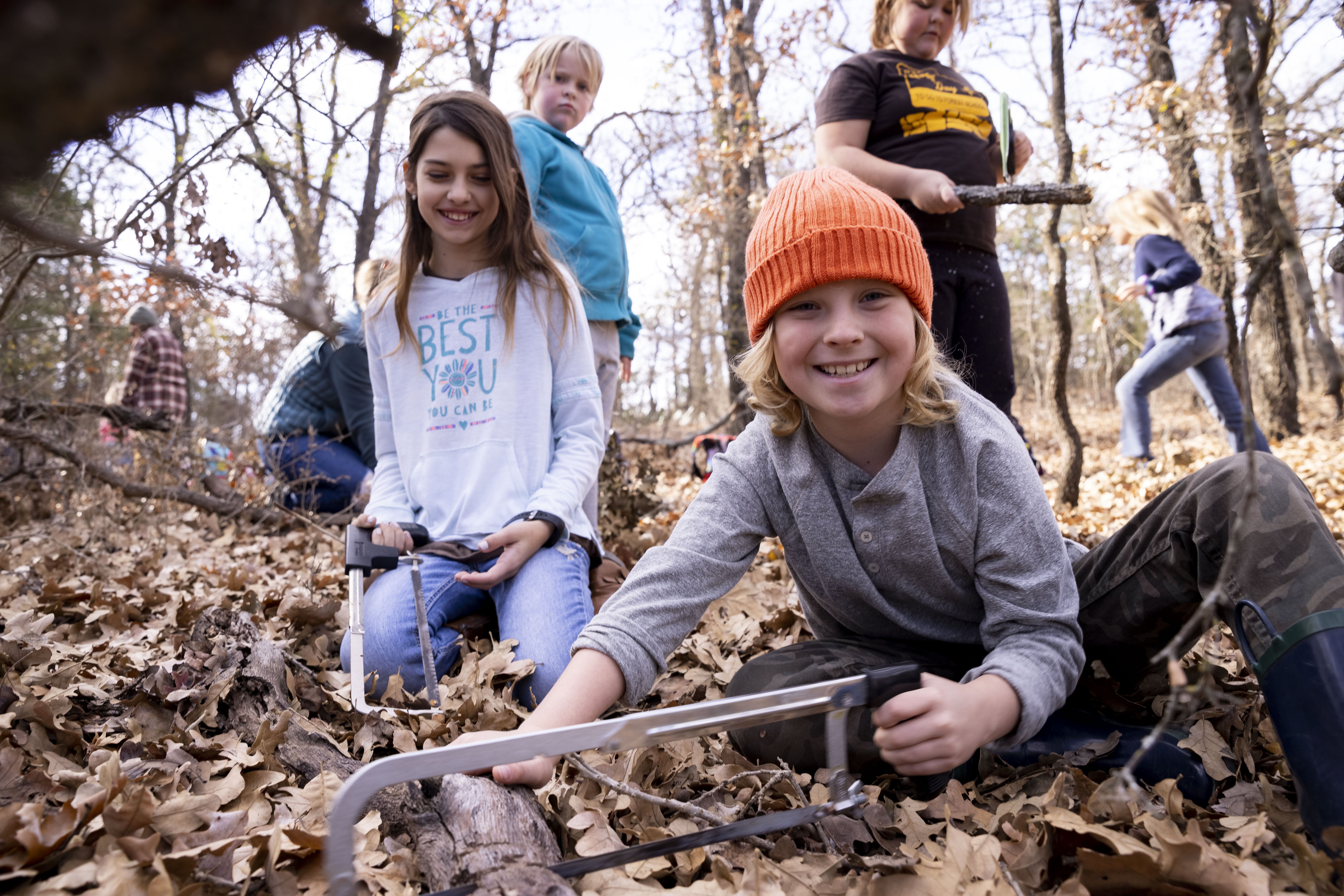 Students cutting wood